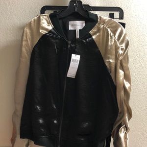 Bcbgeneration metallic black and gold jump suit.